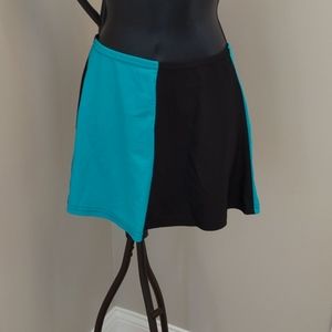 Sun Streak swim skirt in black/turquoise